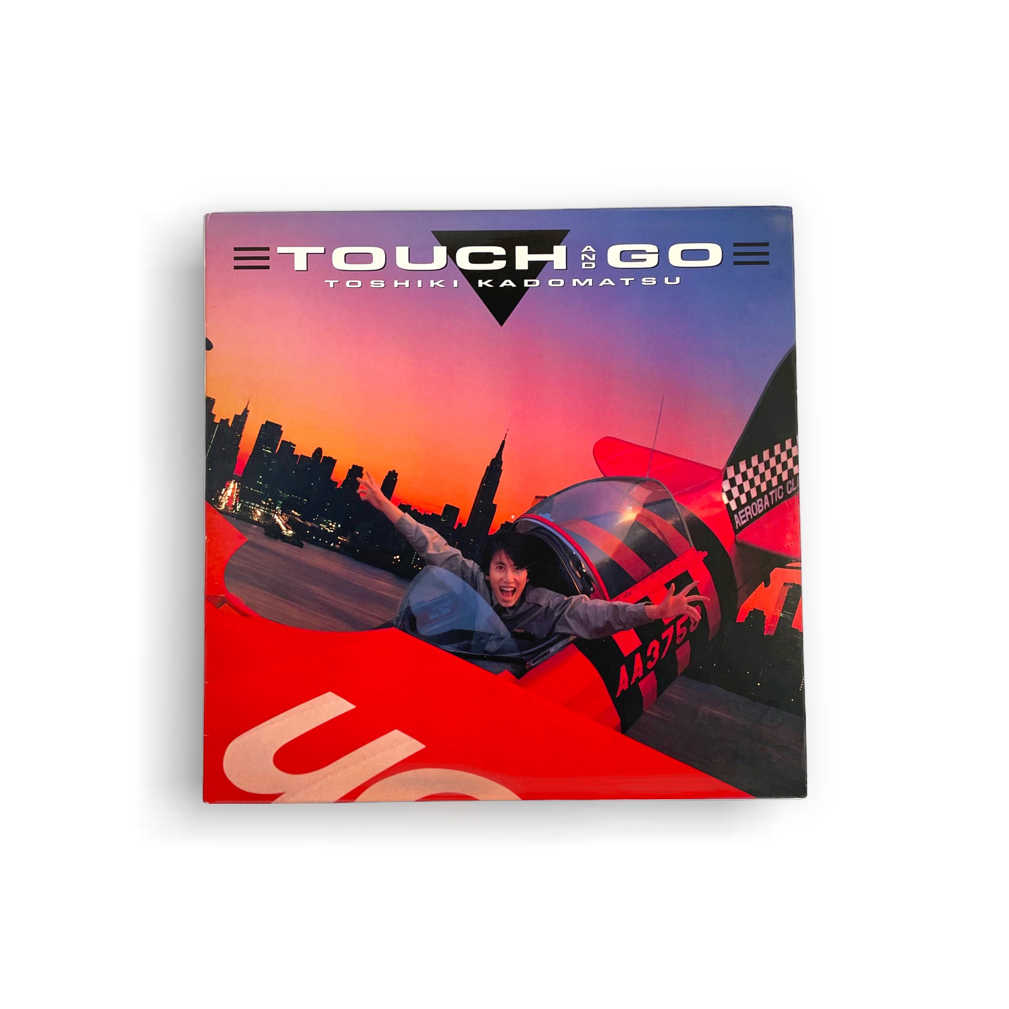 Toshiki Kadomatsu - Touch And Go • 1986 Japan | Commune Records
